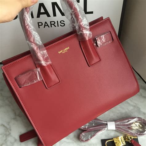 wine red ysl bag|red YSL Bag with tassel.